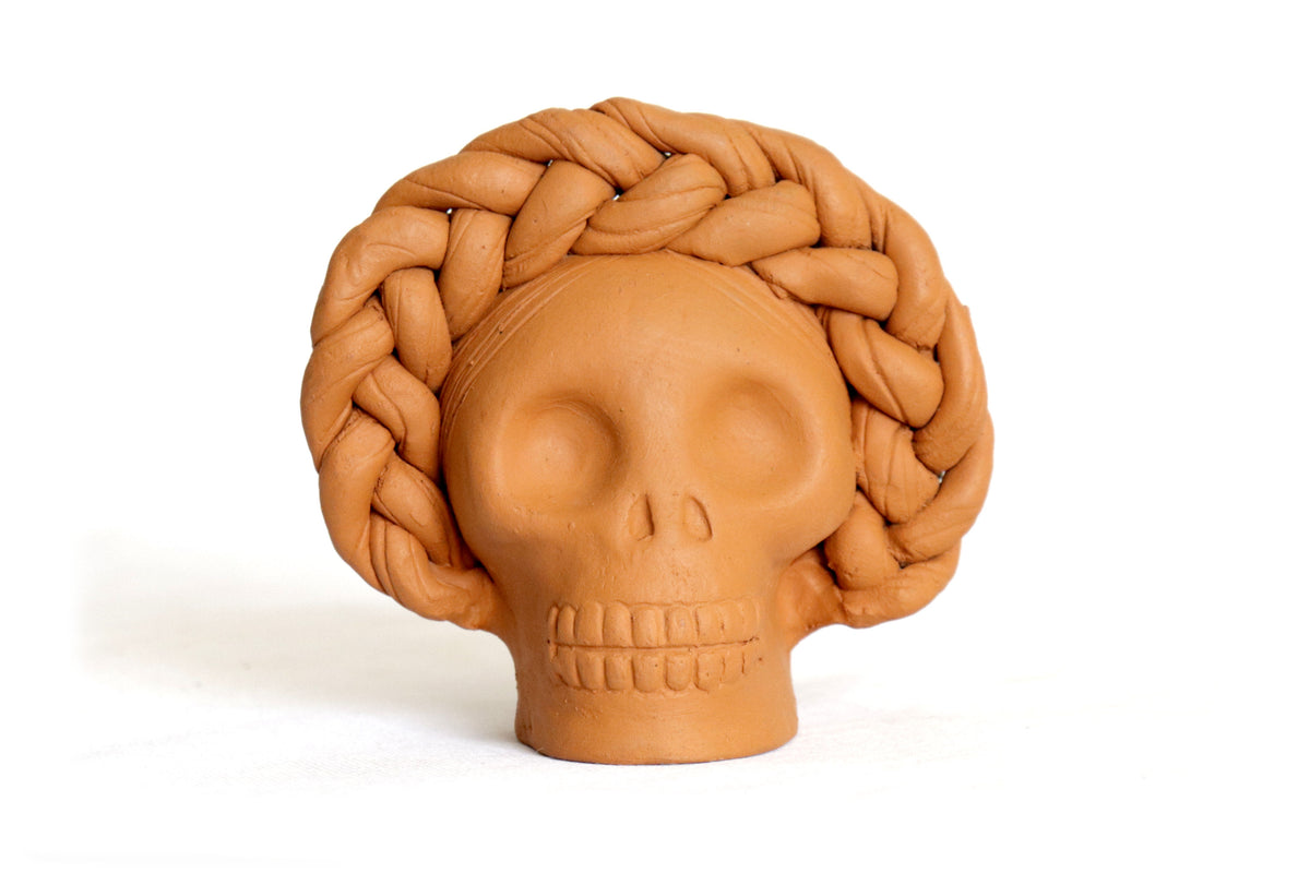 Maceta de calaveras pequeña naranja de chongo Maceta