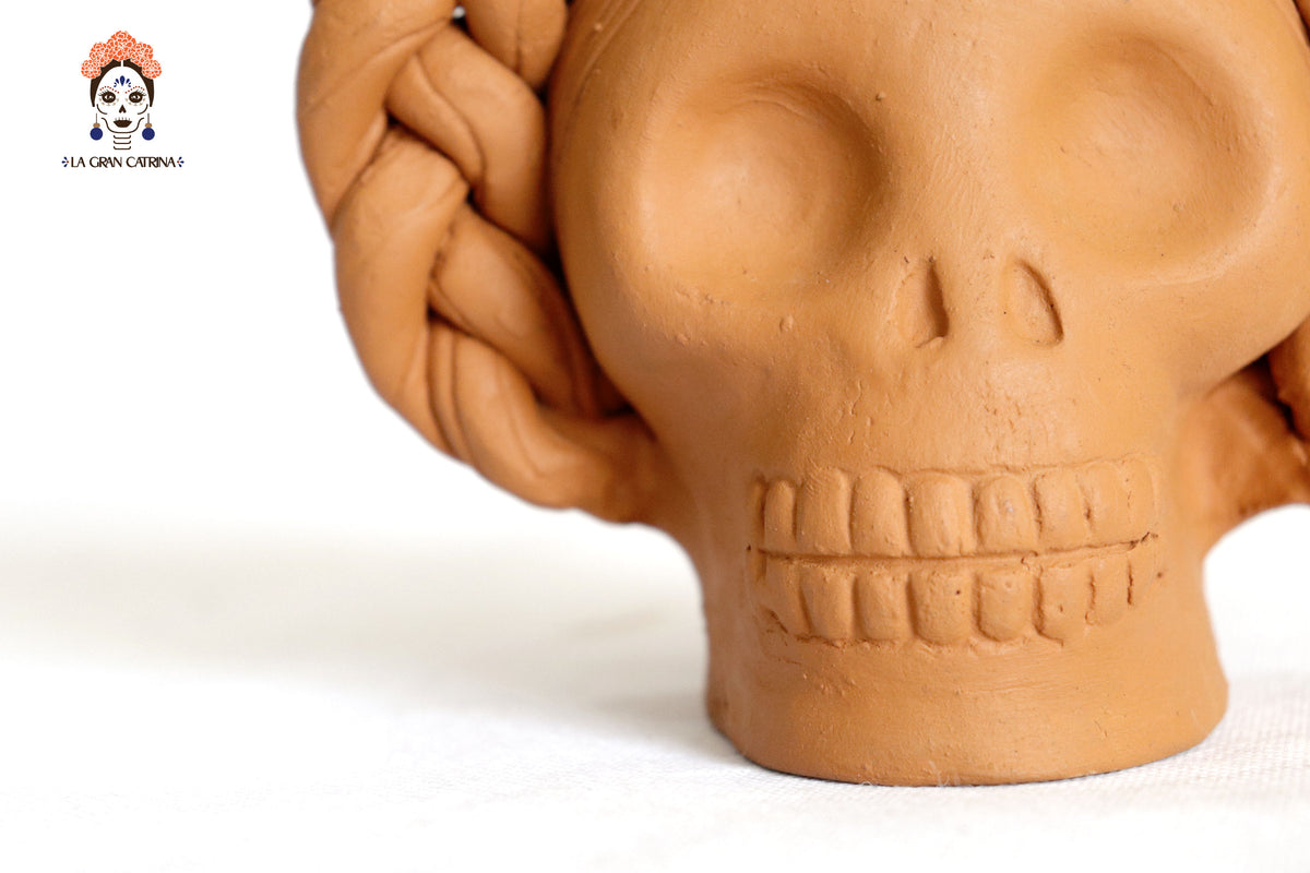 Maceta de calaveras pequeña naranja de chongo Maceta