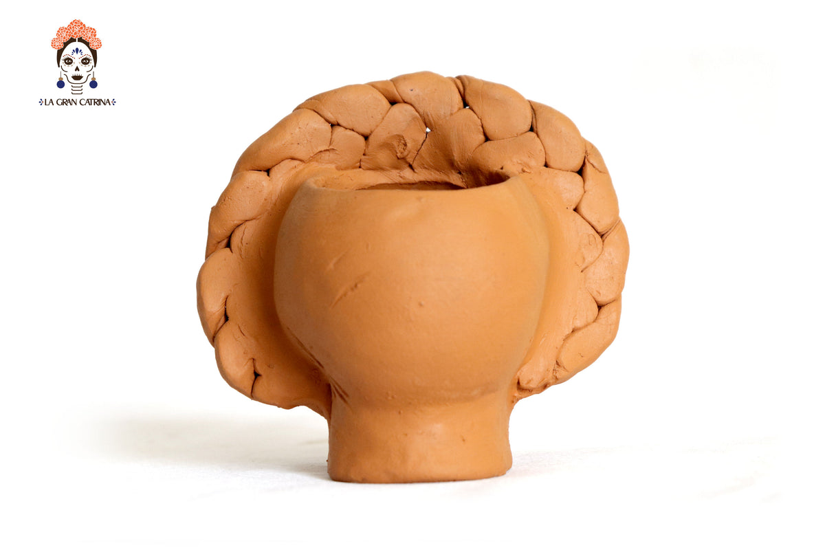 Maceta de calaveras pequeña naranja de chongo